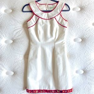 Jade Melody Tam White dress with orange piping
